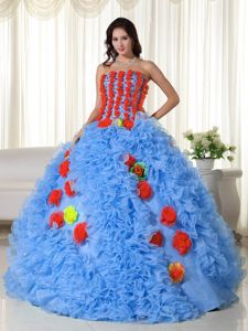 Blue Ruffled Strapless Sweet 15 Dress in Floor-length with Hand Made Flower